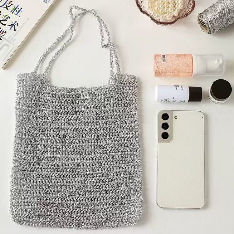 The components of the Elegant Silver Handbag Crochet Kit.