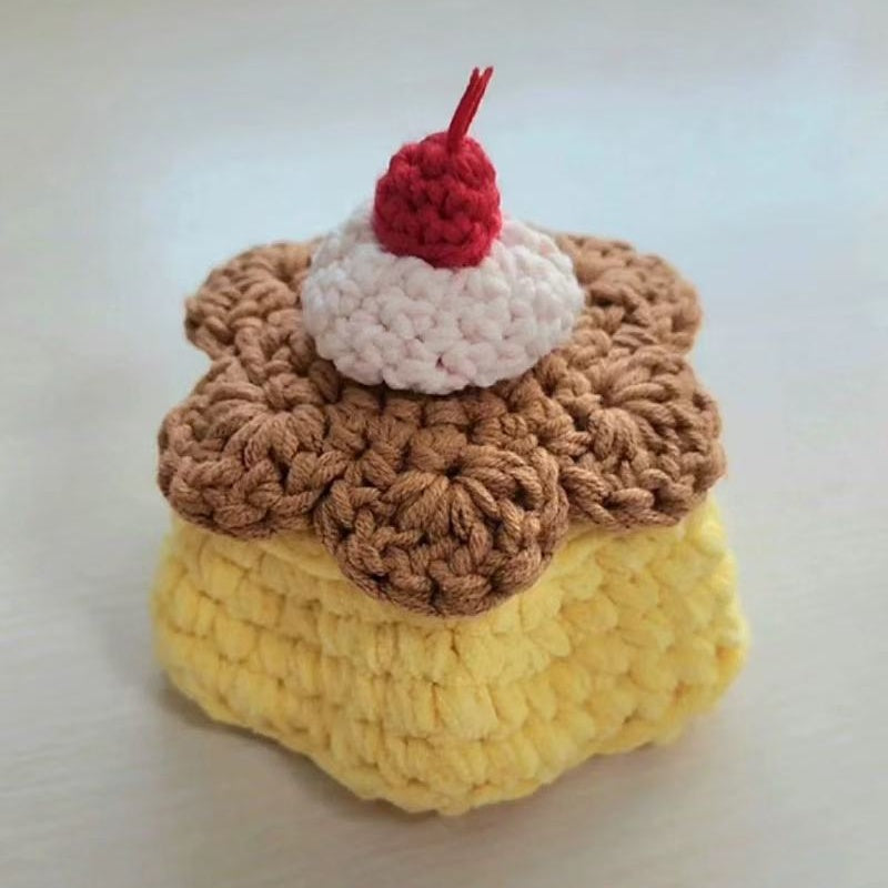 The finished Pudding Storage Box, beautifully crafted with the DIY Crochet Projects kit.